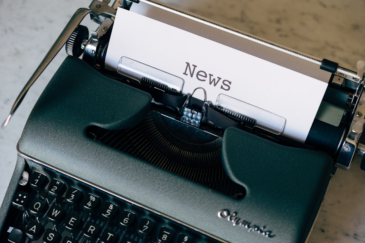 Technology editors monitoring chip supply headlines across APAC screens