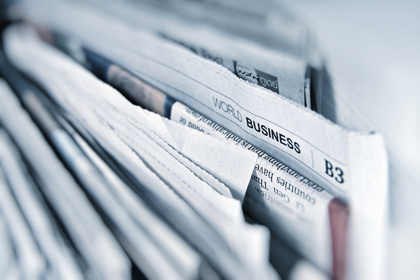 PressSpark business desk monitors tracking APAC corporate headlines